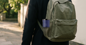 VSITOO S5 heated travel mug in a commuter backpack side pocket