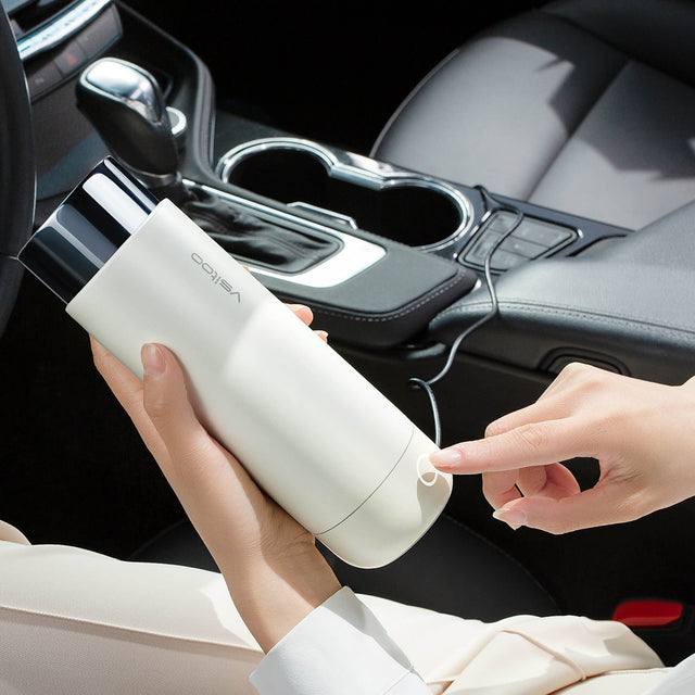 Vsitoo H1 smart mug, with white, the self warming mug is 15oz, with the charging cable for your car, which can heat your drink during your trip.